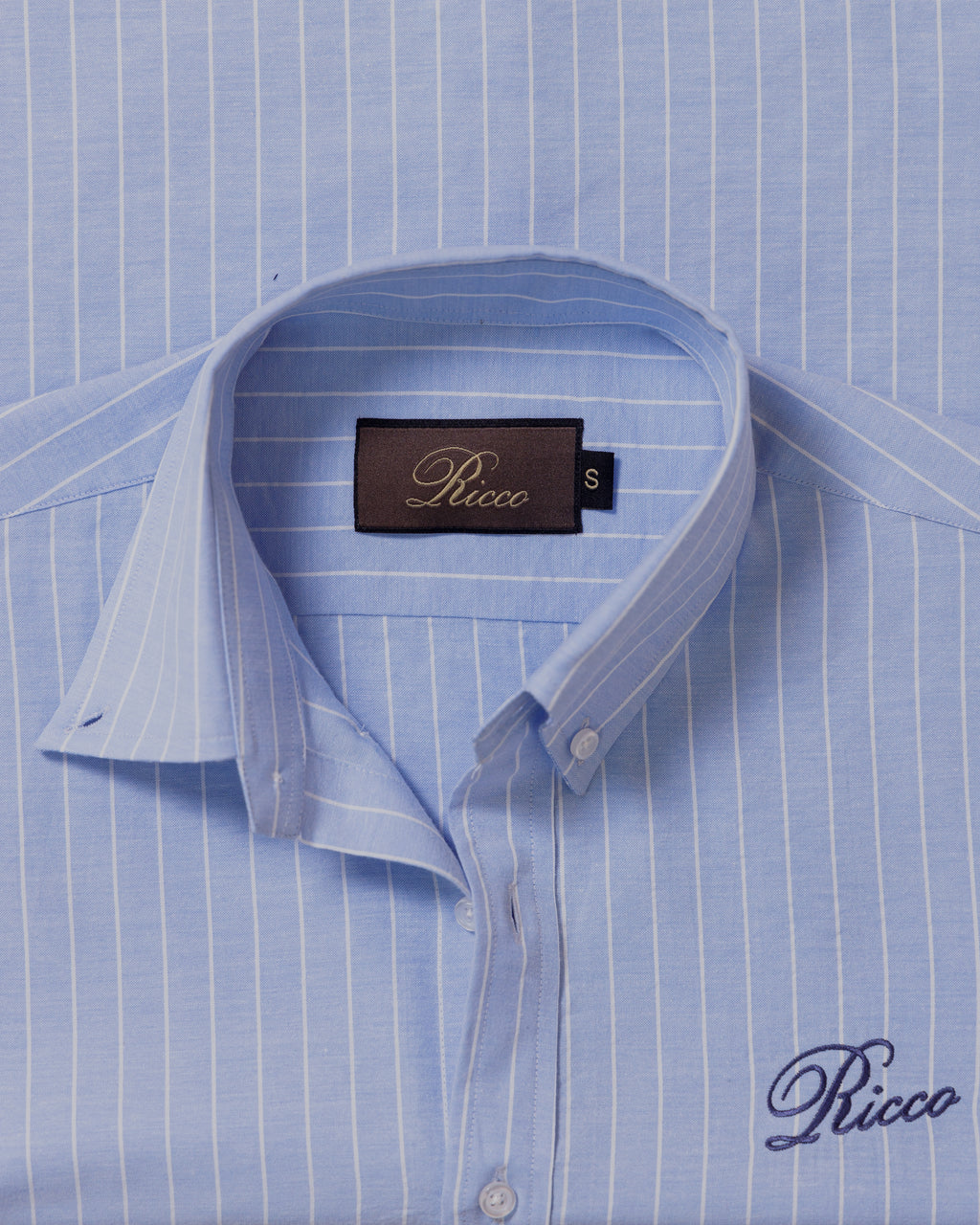 SKYLINE BUTTON DOWN